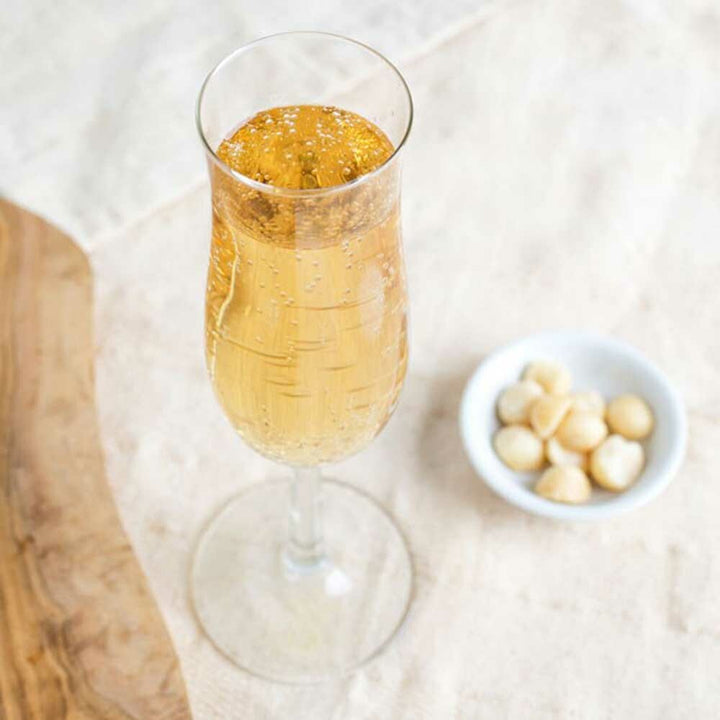 Champagne Flavor Emulsion for High Heat Applications