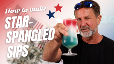 A white man in his 60s holding a red white blue cocktail drink with the text "How to make Star-Spangled Sips"overlaid 
