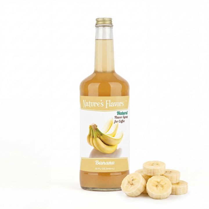 Bottle labeled, "Natural Flavor Syrup for Coffee Banana" next to a pile of banana slices. 