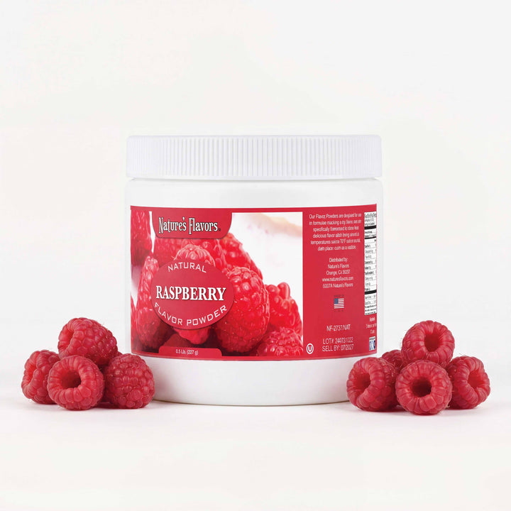 tub labeled, "Natural Raspberry Flavor Powder" next to raspberries 