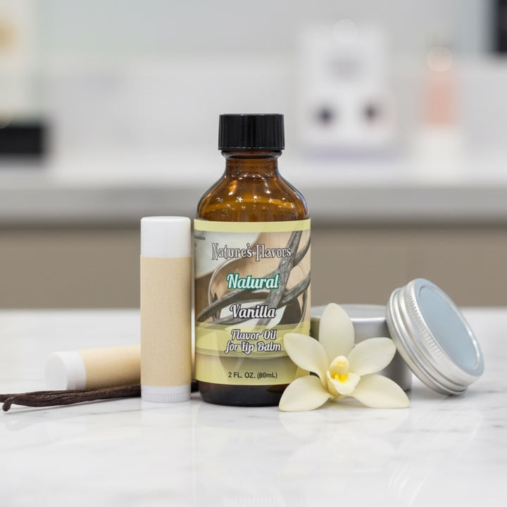 Bottle of Nature's Flavors Natural Vanilla flavor oil with a vanilla flower on a white surface.
