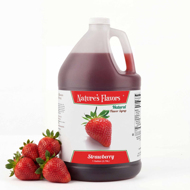 Jug labeled, "Natural Flavor Syrup Strawberry" next to a small pile of strawberries. 