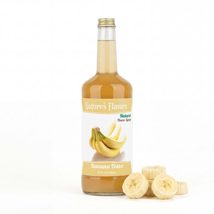 Bottle labeled, "Natural Flavor Syrup Banana Foster" next to a pile of sliced bananas. 