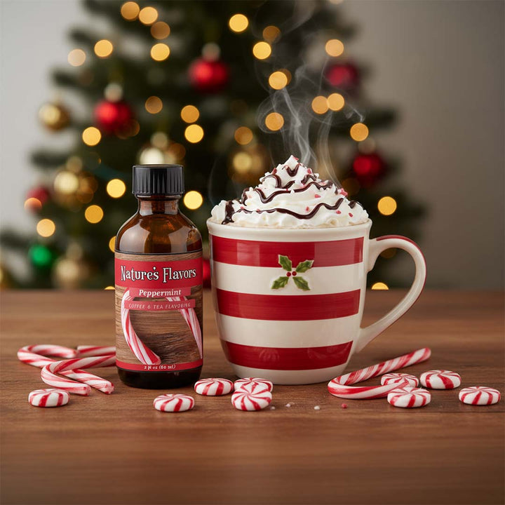 Peppermint mocha with whipped cream, peppermint candy, and a bottle of Nature's Flavors peppermint coffee bean flavoring in front of a Christmas tree.