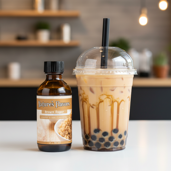 Bottle of 'Nature's Flavors' coffee and tea flavoring next to a bubble tea with a straw on a counter.