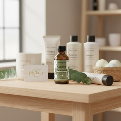 Collection of organic beauty products on a wooden table with a 'Happy Mother's Day' card.