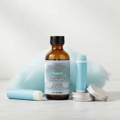Bottle of 'Nature's Flavors' Natural Cotton Candy flavor oil for lip balm on a light background