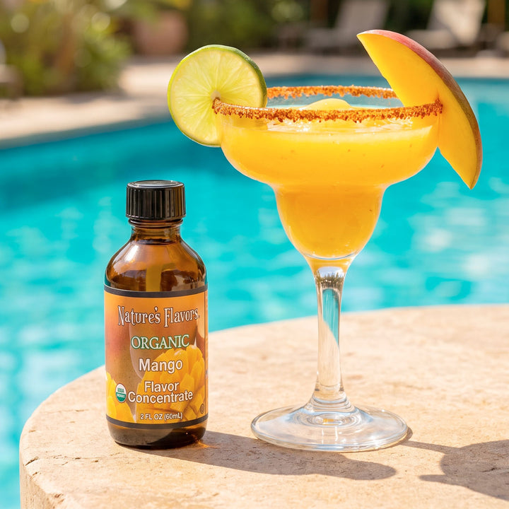 Bottle labeled, "Organic Mango Flavor Concentrate" next to a Margarita glass.