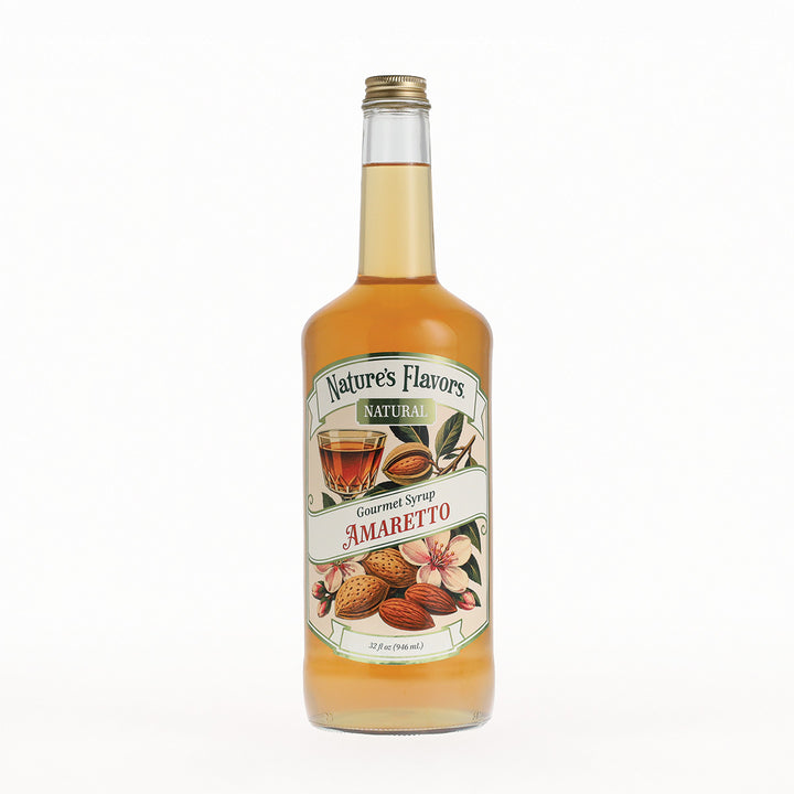 A bottle of Nature's Flavors Gourmet Syrup in Amaretto, filled with a golden-amber liquid, featuring a white and green label with illustrations of almonds and flowers, set against a plain white background.