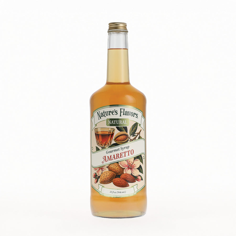 A bottle of Nature's Flavors Gourmet Syrup in Amaretto, filled with a golden-amber liquid, featuring a white and green label with illustrations of almonds and flowers, set against a plain white background.