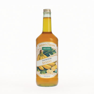 A bottle of Nature's Flavors Organic Gourmet Syrup, Banana flavor, set against a plain white background.