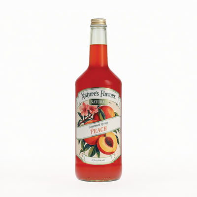 A bottle of Nature's Flavors Gourmet Syrup Peach featuring a detailed peach and floral label, set against a plain white background.