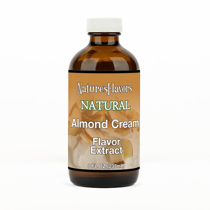 An 8 fl oz amber glass bottle of Nature's Flavors Almond Cream Flavor Extract, Natural with a white cap, centered on a white background.