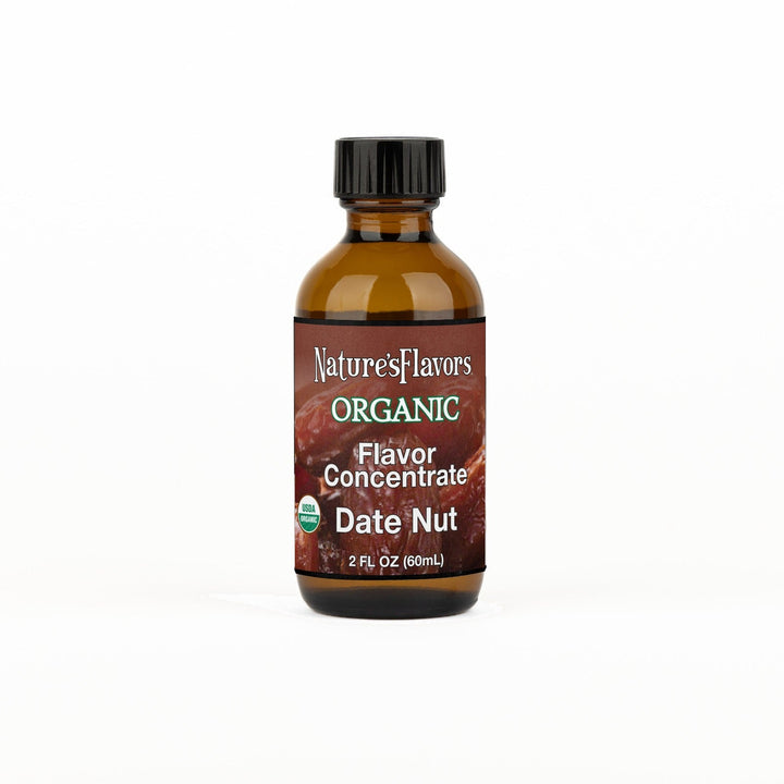A 2 fl oz amber glass bottle of Nature's Flavors Organic Flavor Concentrate, Date Nut with a black cap, centered on a white background.