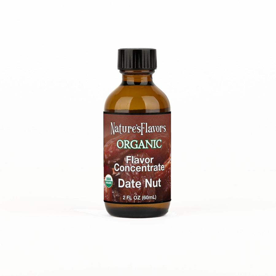 A 2 fl oz amber glass bottle of Nature's Flavors Organic Flavor Concentrate, Date Nut with a black cap, centered on a white background.