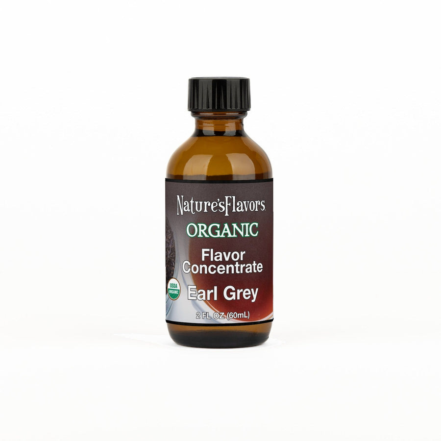A 2 fl oz amber glass bottle of Nature's Flavors Organic Flavor Concentrate, Earl Grey with a black cap, centered on a white background.