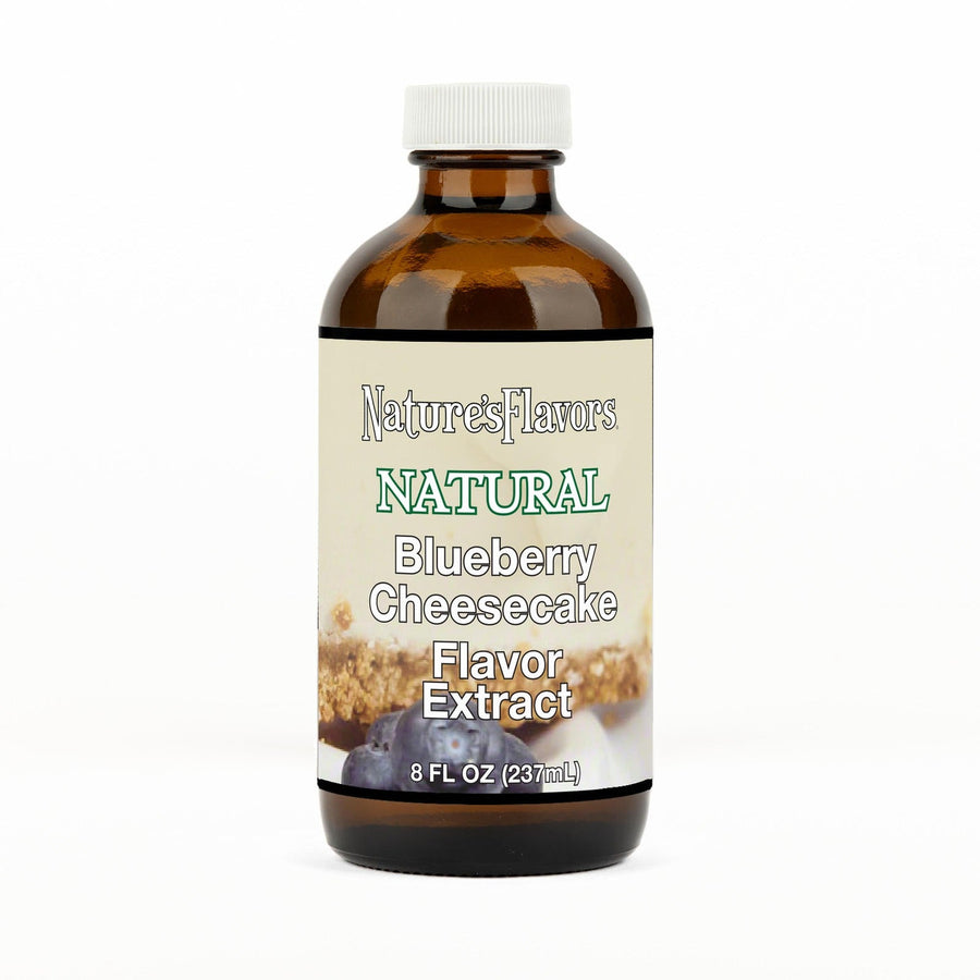 An 8 fl oz amber glass bottle of Nature's Flavors Blueberry Cheesecake Flavor Extract, Natural with a white cap, centered on a white background.