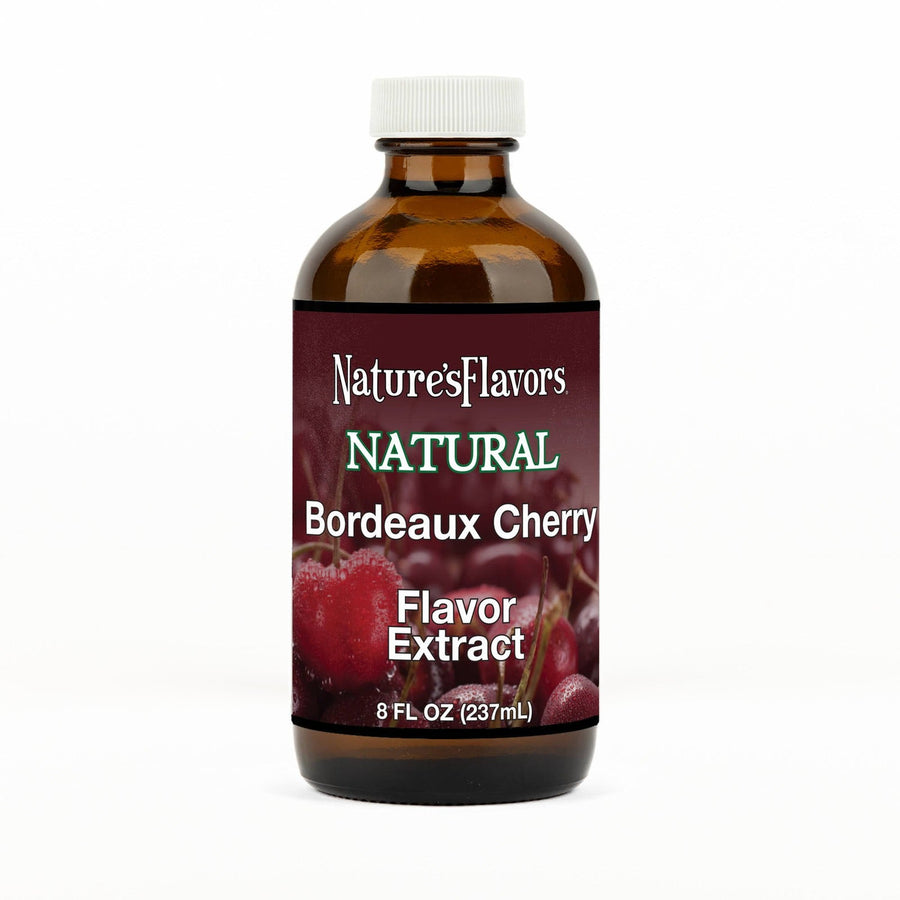 An 8 fl oz amber glass bottle of Nature's Flavors Bordeaux Cherry Flavor Extract, Natural with a white cap, centered on a white background.
