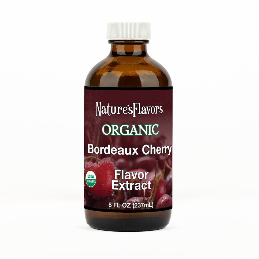 An 8 fl oz amber glass bottle of Nature's Flavors Bordeaux Cherry Flavor Extract, Organic with a white cap, centered on a white background.