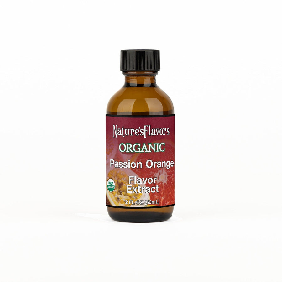 A 2 fl oz amber glass bottle of Nature's Flavors Passion Orange Flavor Extract, Organic with a black cap, centered on a white background.