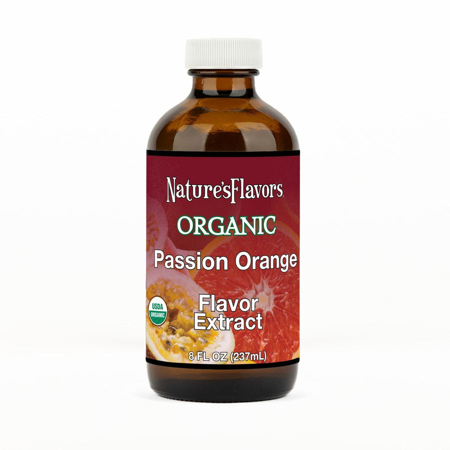 An 8 fl oz amber glass bottle of Nature's Flavors Passion Orange Flavor Extract, Organic with a white cap, centered on a white background.