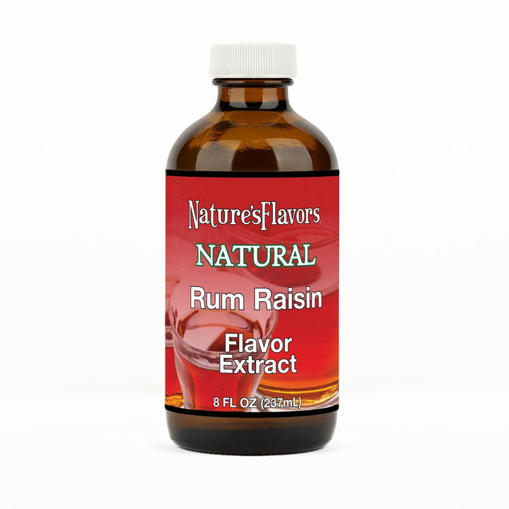 An 8 fl oz amber glass bottle of Nature's Flavors Rum Raisin Flavor Extract, Natural with a white cap, centered on a white background.