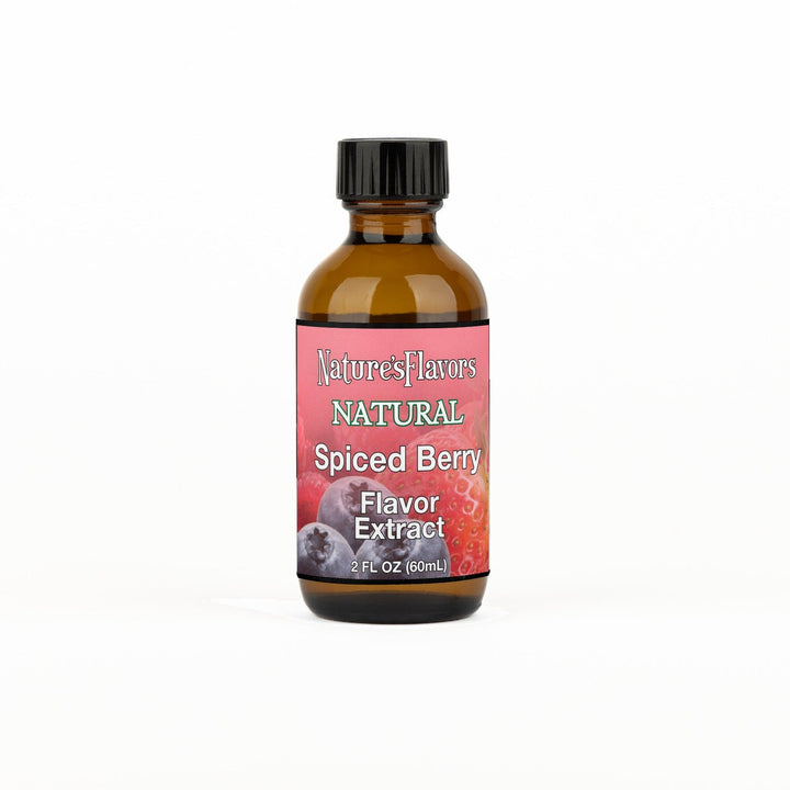 A 2 fl oz amber glass bottle of Nature's Flavors Spiced Berry Flavor Extract, Natural with a black cap, centered on a white background.