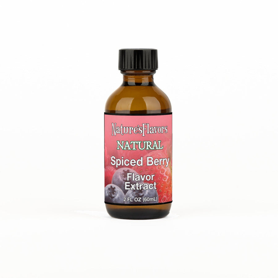 A 2 fl oz amber glass bottle of Nature's Flavors Spiced Berry Flavor Extract, Natural with a black cap, centered on a white background.