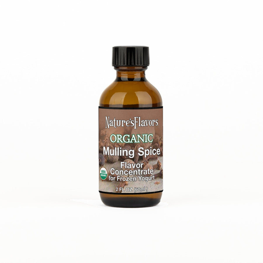 A 2 fl oz amber glass bottle of Nature's Flavors Organic Mulling Spice Flavor Concentrate For Frozen Yogurt with a black cap, centered on a white background.