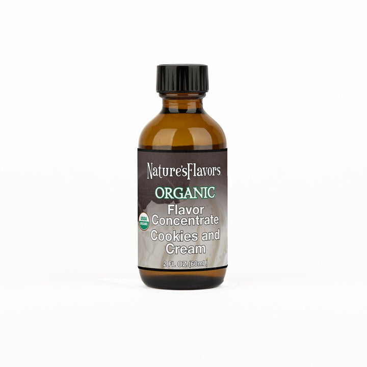 A 2 fl oz amber glass bottle of Nature's Flavors Organic Flavor Concentrate, Cookies and Cream with a black cap, centered on a white background.