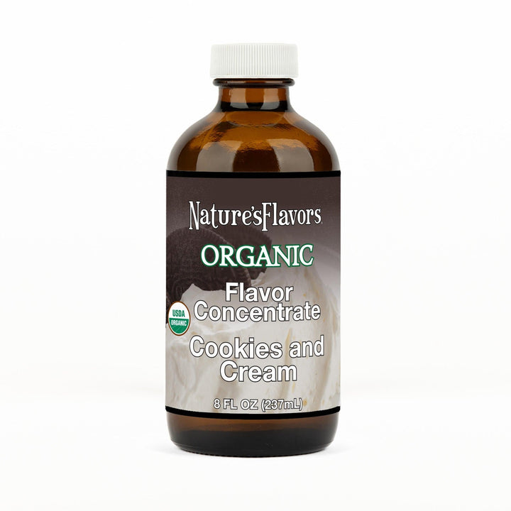 An 8 fl oz amber glass bottle of Nature's Flavors Organic Flavor Concentrate, Cookies and Cream with a white cap, centered on a white background.