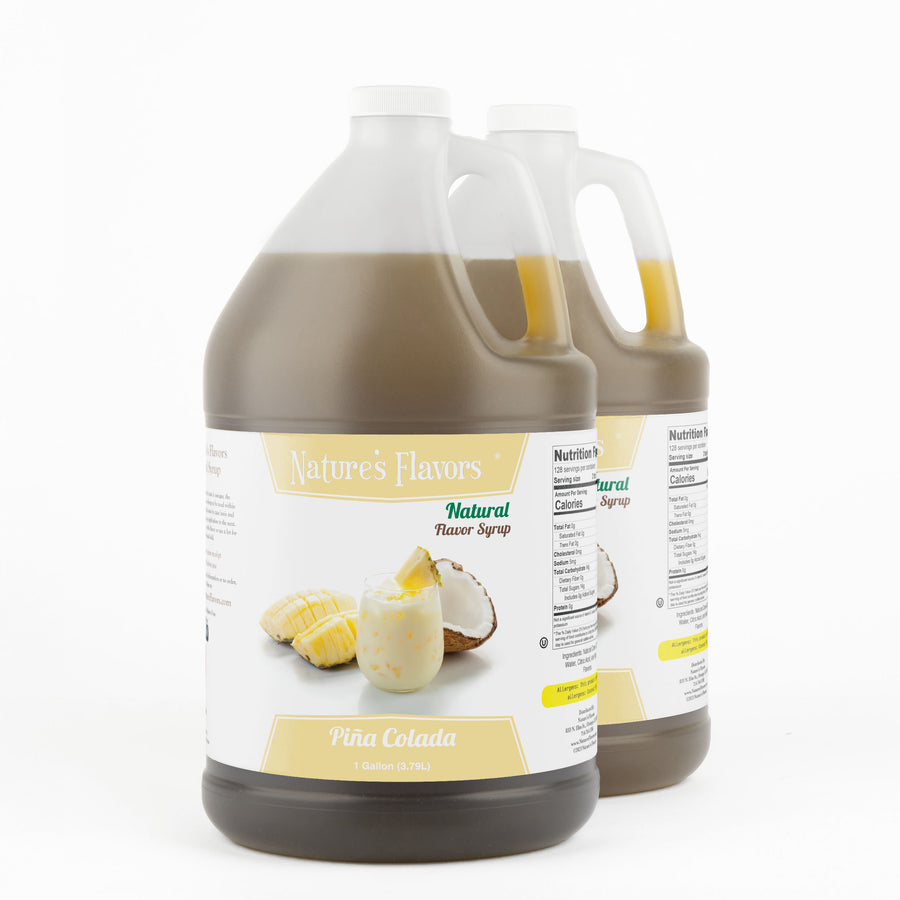 Two 1-gallon bottles with labels that read, "Natural Flavor Syrup Piña Colada."
