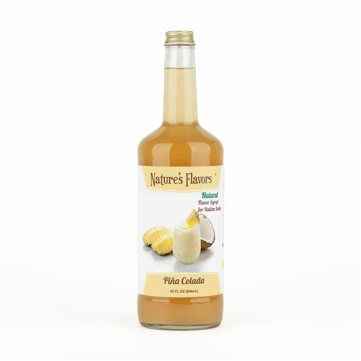 A transparent bottle with orange liquid and a label on it that reads, “Natural Flavor Syrup for Italian Soda Piña Colada. 32oz.”
