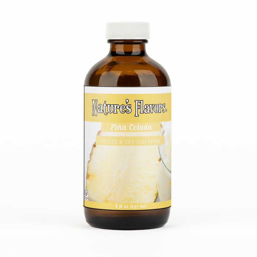 A brown bottle with a label that reads, "Piña Colada Coffee & Tea Flavoring. 8 fl oz."
