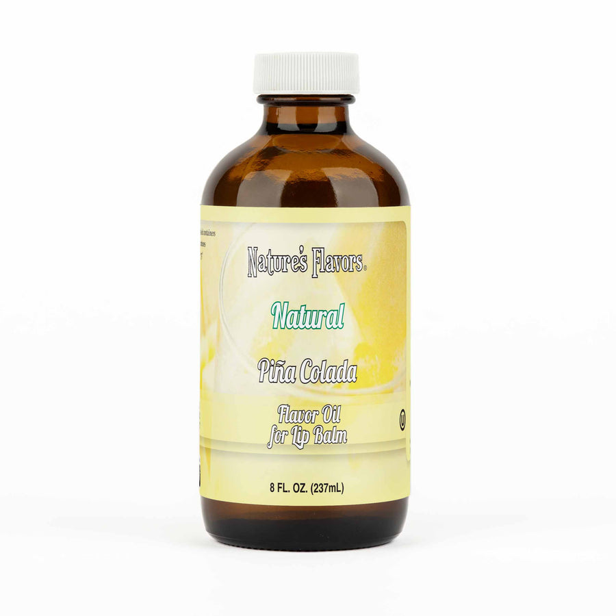 A brown bottle with a label that reads, "Natural Piña Colada Flavor Oil for Lip Balm. 8 fl oz."
