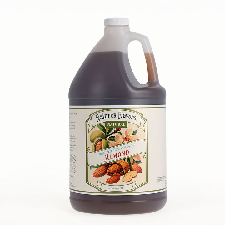 A large plastic jug of Nature's Flavors Natural Sugar Free Almond Syrup with a white cap and a detailed cream-colored label showing almonds and fruit illustrations, set against a plain white background.