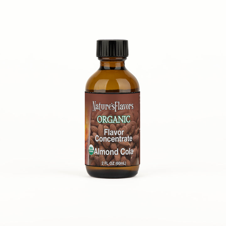Bottle labeled, "Organic Flavor Concentrate Almond Cola"