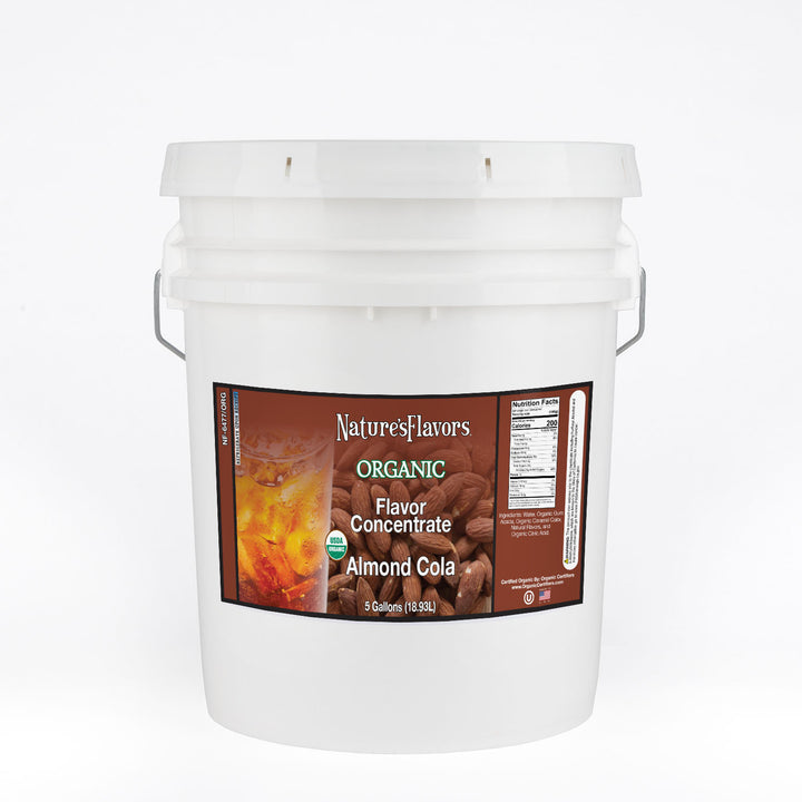 White bucket labeled, "Organic Flavor Concentrate Almond Cola"