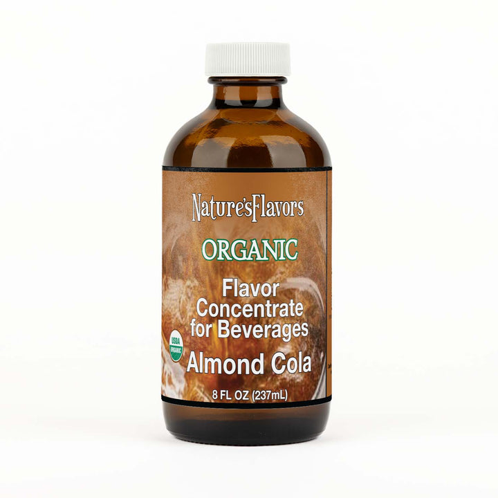 Bottle labeled, "Organic Flavor Concentrate for Beverages Almond Cola".