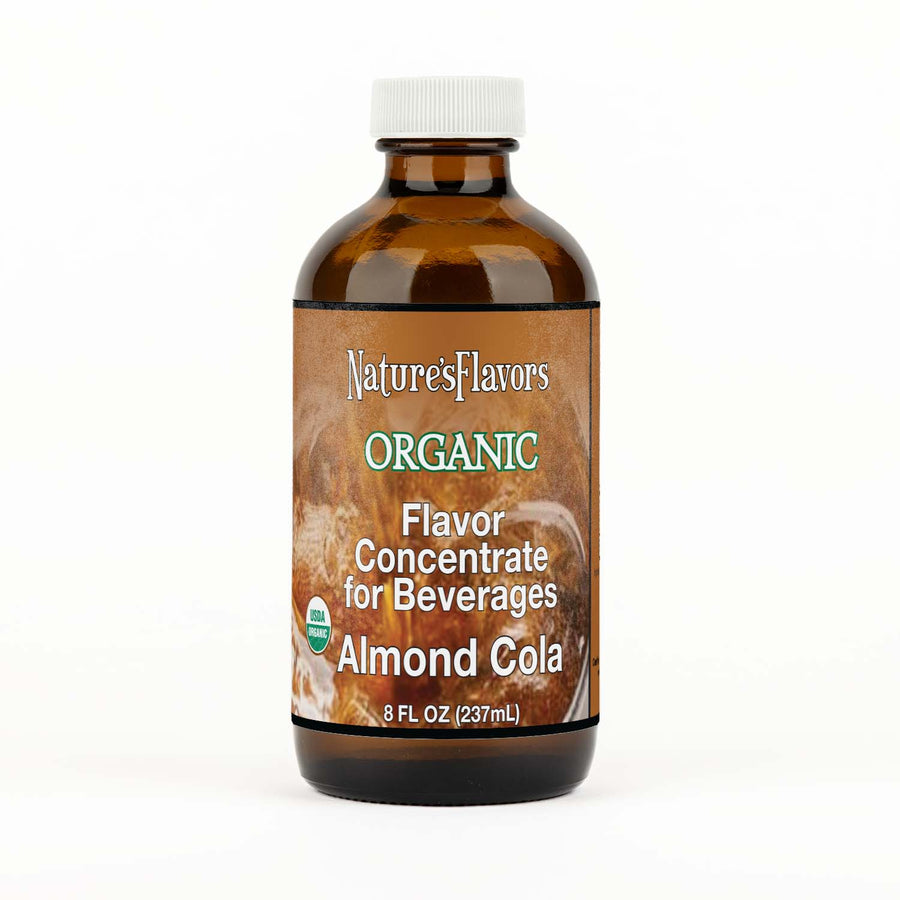 Bottle labeled, "Organic Flavor Concentrate for Beverages Almond Cola".