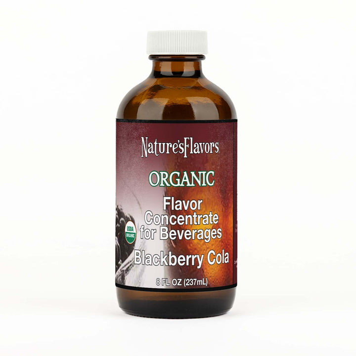 Bottle Labeled, "Organic Flavor Concentrate for Beverages Blackberry Cola."