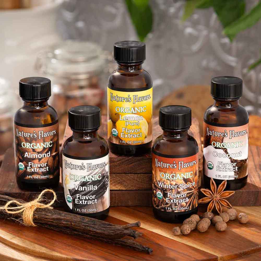 Nature's Flavors organic baking flavor sample pack with cakes, cookies, frosting, and baking ingredients