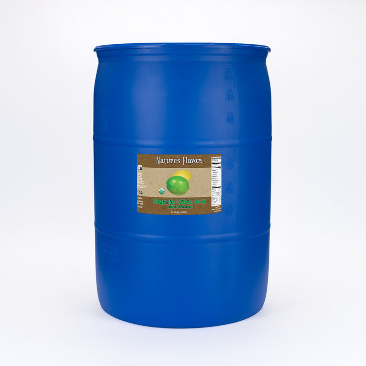 A large blue drum with a label that reads, "Organic Citric Acid (50% Solution). 55 gallon."

