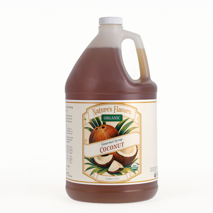 A one-gallon plastic jug of Nature's Flavors Organic Coconut Gourmet Syrup, filled with dark brown liquid and featuring a cream-colored label with illustrations of coconuts, on a white background.