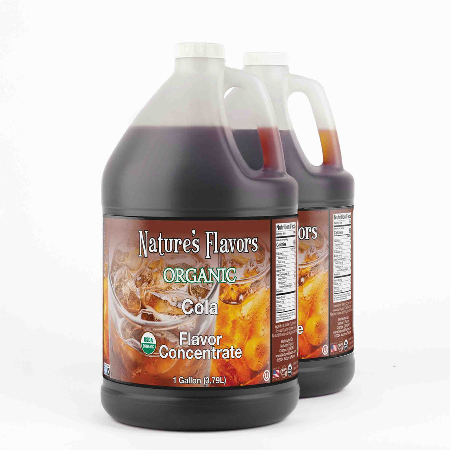 Two, 1 gallon bottles both with a label that read, "Organic Cola Flavor Concentrate. 1 gallon."