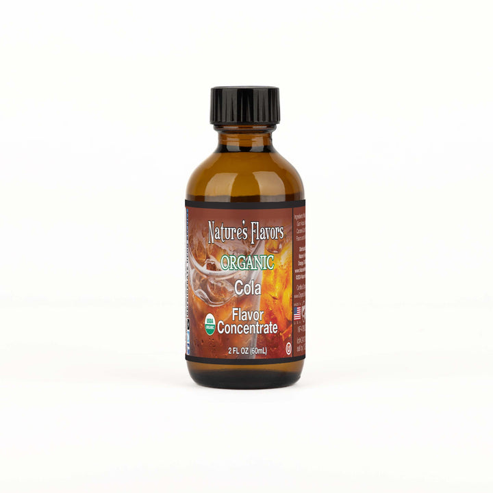 A brown bottle with a label that reads, "Organic Cola Flavor Concentrate. 2 fl oz."