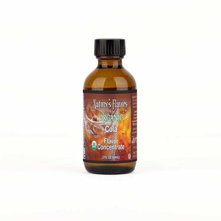 A brown bottle with a label that reads, "Organic Cola Flavor Concentrate. 2 fl oz."