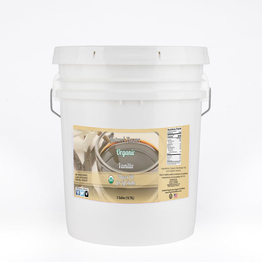 White bucket labeled “Organic Vanilla Flavor Oil for Lip Balm"