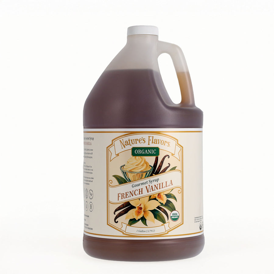 A one-gallon plastic jug of Nature's Flavors Organic French Vanilla Gourmet Syrup, filled with dark brown syrup and featuring a cream-colored label with vanilla illustrations, on a white background.