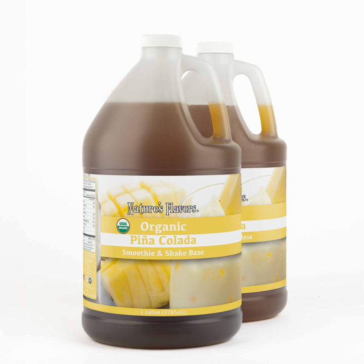 Two, 1 gallon bottles both with a label that read, "Organic Piña Colada Smoothie & Shake Base."